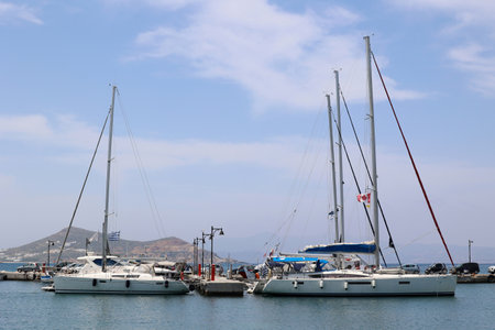 Sailing boats in the port of the Cyclades Island of Naxos-Greeceの写真素材