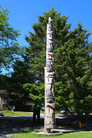 Totem pole in a park of the small town of Sitka, Alaskaの写真素材