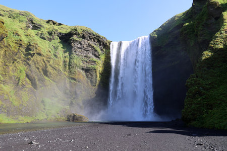 Skogafoss waterfall on the SkÃ³gÃ¡ river in southern Icelandの写真素材