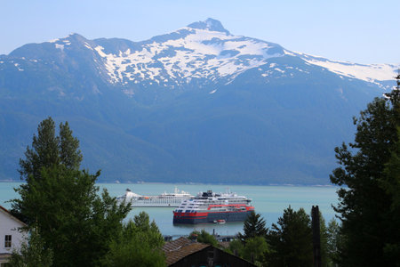 Expedition ship in Chilkoot Inlet viewed from Fort William H. Seward in Haines, Alaskaの写真素材