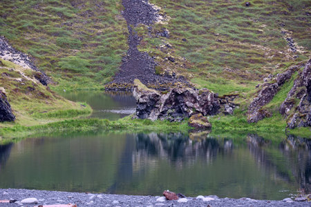 Reflection in the water at Djupalon Lagoon, Snaefellsnes Peninsula-Icelandの写真素材