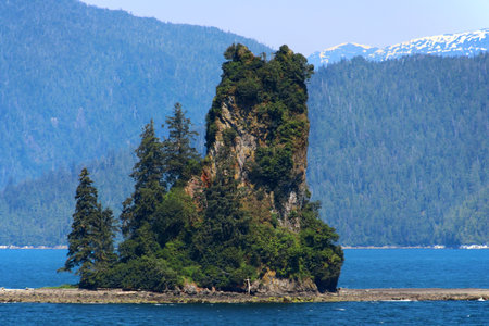 New Eddystone Rock a volcanic spire Misty Fjords National Monument Park near Ketchikan Inside Passage Alaska USAの写真素材
