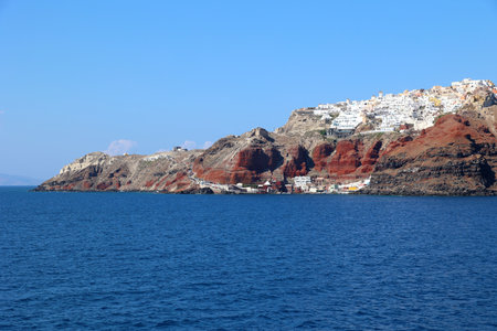 View of Oia on the crater rim from the Cyclades island of Santorini-Thera -Greeceの写真素材
