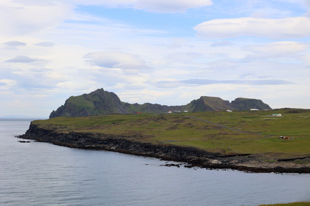 Coastal landscape of Heimaey Island -Vestmannaeyjar-Icelandの写真素材