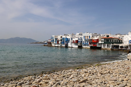 View of the houses of Little Venice seen from the water Mykonos Cyclades Greeceの写真素材