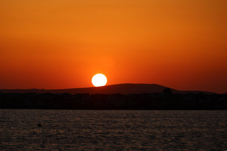 Sunset in the port of the Cyclades Island of Naxos-Greeceの写真素材