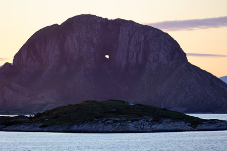 View of the famous rock Torghatten at sunrise, Norwayの写真素材