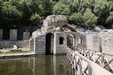 Ancient remains of the ruined city of Butrint-Treasury of the Asclepius Sanctuary next to the Theaterの写真素材