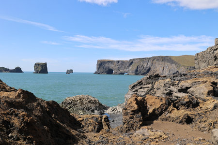 Iceland-Dyrholaey Peninsula, fantastic coastline with black sand beachの写真素材