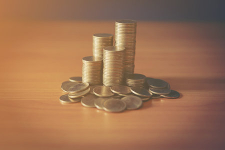 stack of money, rows of coins for finance and banking concept