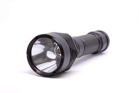 Isolated black flashlight on white backgroundの写真素材