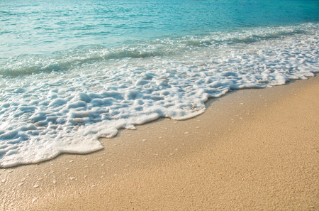 beautiful wave of ocean on the beachの写真素材