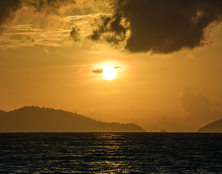 orange sunset over the sea at twilightの写真素材