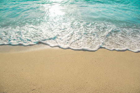 beautiful wave of ocean on the beachの写真素材