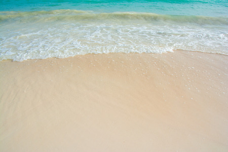 beautiful wave of ocean on the beachの写真素材