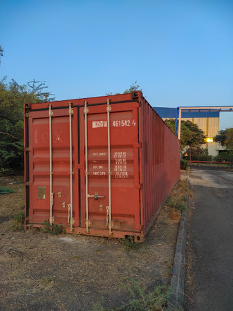 A Stacked cargo containers in storage area photos