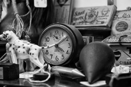 Antiques for Sale - Black and white of antiques on a shelf for sale at a local antique shop 