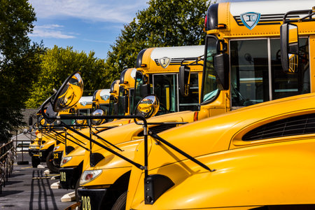 Kokomo - Circa October 2016: Yellow School Buses in a District Lot Waiting to Depart for Students IIのeditorial素材