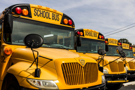Kokomo - Circa October 2016: Yellow School Buses in a District Lot Waiting to Depart for Students Iのeditorial素材