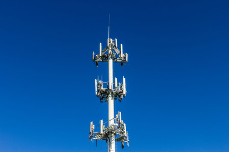 Telecommunications and Wireless Equipment Tower with Directional Mobile Phone Antenna - Landscape