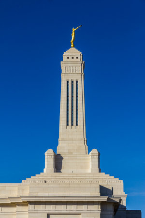 Carmel - Circa February 2017: The Angel Moroni Stands atop the Indianapolis Indiana Mormon Temple Iのeditorial素材
