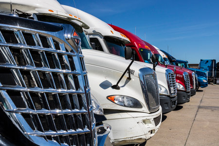 Indianapolis - Circa June 2017: Colorful Semi Tractor Trailer Trucks Lined up for Sale XIIIのeditorial素材