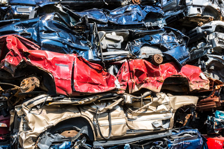 Indianapolis - Circa September 2017: Stacked junk yard clunker cars prepared for crushing to be recycled IXのeditorial素材