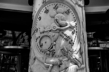 Chicago - Circa May 2018: Cartoon Mickey Mouse watch greets customers at the downtown Disney Store. Disney Store is the Official Site for Disney Shopping IIIのeditorial素材