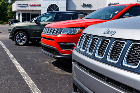 Logansport - Circa June 2018: Jeep Wrangler on display at a Chrysler Jeep dealership. The four...
