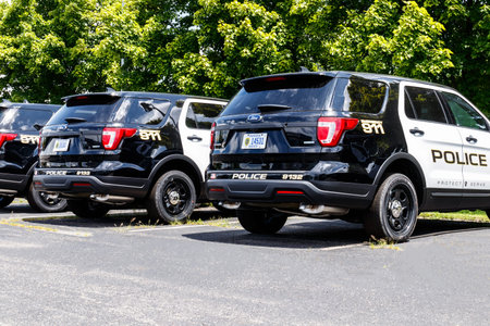 Noblesville - Circa July 2018: New police cars waiting for calls at the station II