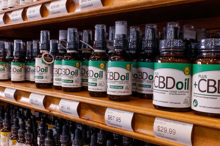 Indianapolis - Circa February 2019: Various CBD oil products. The popularity of CBD oil as a medicinal product has skyrocketed IV