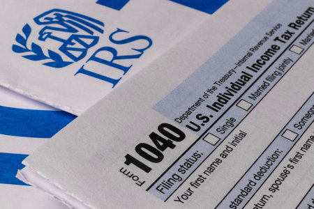 Indianapolis - Circa March 2019: New IRS 1040 Tax forms. The new 1040 forms are simplified from...