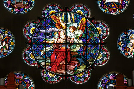 Indianapolis - Circa October 2019: Stained Glass window at the Saint John the Evangelist church portraying St. Johnのeditorial素材
