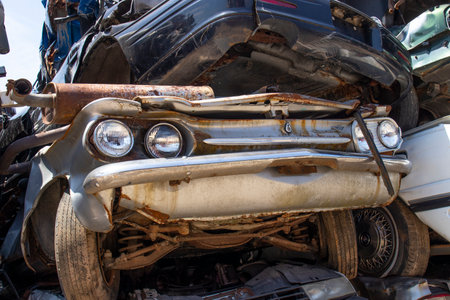 Indianapolis - Circa May 2020: Junk Corvair that has been crushed and stacked. The remains will be recycled, salvaged or sold for parts.のeditorial素材
