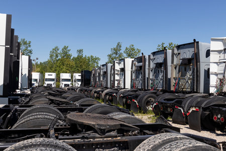 Indianapolis - Circa June 2020: Semi Tractor Trailer Trucks Lined up for Sale.のeditorial素材