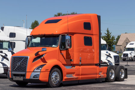 Indianapolis - Circa August 2020: Volvo Semi Tractor Trailer Trucks Lined up for Sale. Volvo is one of the largest truck manufacturers.のeditorial素材