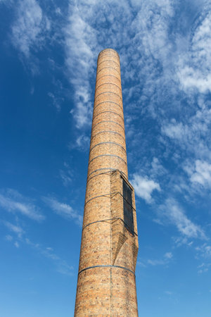 Toledo - Circa September 2020: Overland smokestack in the Overland Industrial Park, the final remaining smokestack of the Willys-Overland Automobile Company factory in Toledo.のeditorial素材