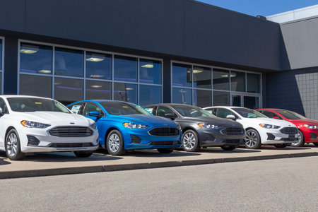 Plainfield - Circa September 2020: Ford Fusion display at a dealership. Ford sells products under the Lincoln and Motorcraft brands.のeditorial素材