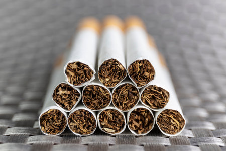 Cigarette close-up. Quitting smoking is the single easiest way to avoid heart disease.の写真素材