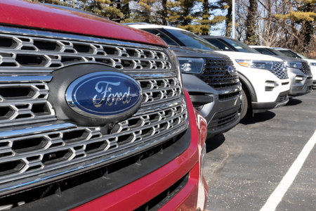Indianapolis - Circa March 2021: Ford SUV display at a dealership. Ford sells traditional gasoline, electric and hybrid SUV models.のeditorial素材