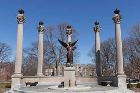 Muncie - Circa March 2021: Beneficence statue on the campus of Ball State University. The five pillars represent the Ball brothers and Beneficence's hand stretches to welcome new students.のeditorial素材