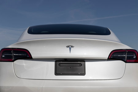 Indianapolis - Circa March 2021: Tesla electric vehicles awaiting preparation for sale. Tesla products include electric cars, battery energy storage and solar panels.のeditorial素材