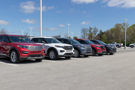 Plainfield - Circa April 2021: Ford Explorer display at a dealership. Ford offers the Explorer in a...