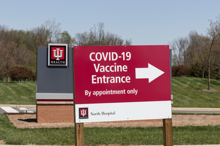 Indianapolis - Circa May 2021: Indiana University and IU Health are offering COVID-19 Vaccine by appointment at IU North Hospital.のeditorial素材