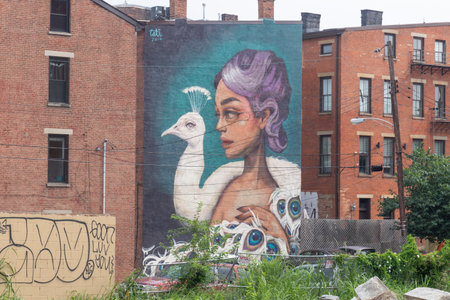 Cincinnati - Circa July 2021: Urban mural by Miami-based artist Tatiana Suarez.のeditorial素材