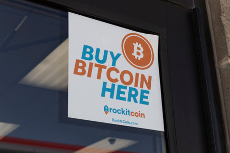 Cuba - Circa September 2021: RockItCoin Bitcoin banner. RockItCoin lets ordinary people invest in Bitcoin and cryptocurrency.のeditorial素材