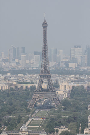 Paris - Circa May 2010 - Eiffel Tower aerial view with downtown Paris in the background.のeditorial素材