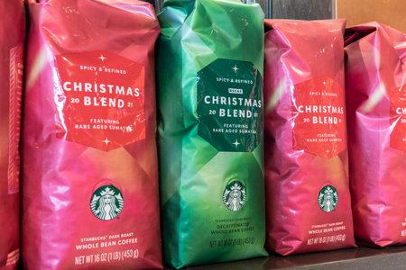 Indianapolis - Circa December 2021: Starbucks holiday themed coffee. Each year, Starbucks celebrates Fall with Pumpkin Spice Lattes and Winter with Christmas-colored drinks.のeditorial素材