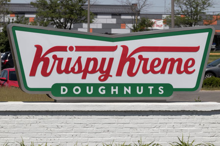 Indianapolis - Circa June 2022: Krispy Kreme doughnut shop. Krispy Kreme has a loyal following for...
