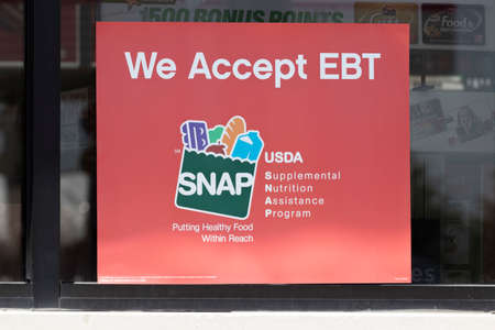 Lebanon - Circa June 2022: SNAP and EBT Accepted here sign. SNAP and Food Stamps provide nutrition benefits to supplement the budgets of disadvantaged families.のeditorial素材